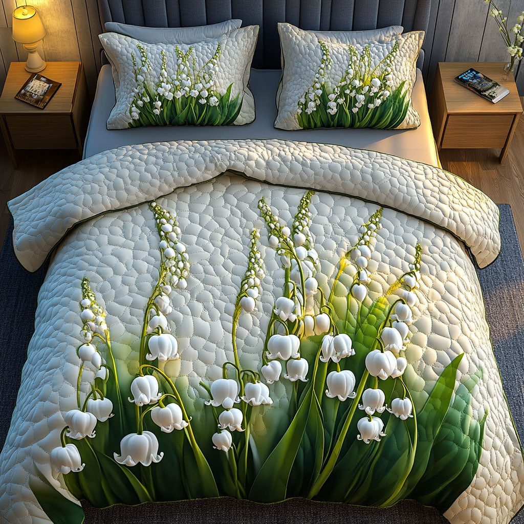 Lily Serenity quilted 3-piece bedding set on a made bed with two matching pillow shams