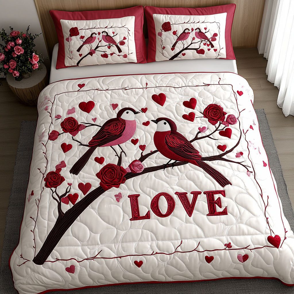 Lovebirds Forever quilted 3-piece bedding set on a made bed with two matching pillow shams