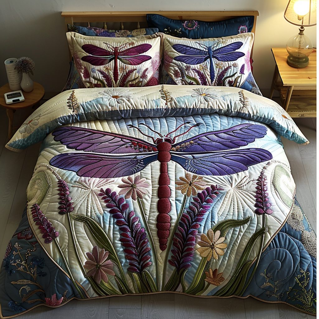 Lovely Dragonfly quilted 3-piece bedding set on a made bed with two matching pillow shams