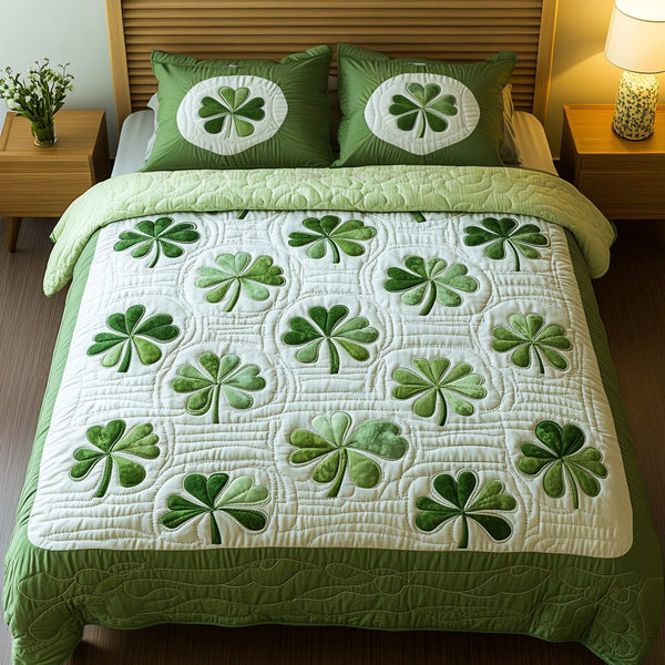 Lucky Threads quilted 3-piece bedding set on a made bed with two matching pillow shams