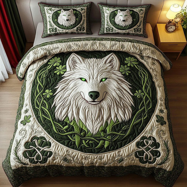 Lunar Clover quilted 3-piece bedding set on a made bed with two matching pillow shams