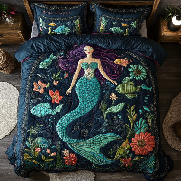 Magical Mermaid quilted 3-piece bedding set on a made bed in a light coastal bedroom