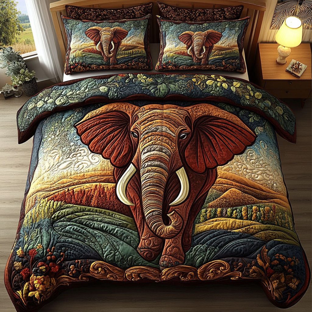 Majestic Elephant Dream quilted 3-piece bedding set on a made bed with two matching pillow shams