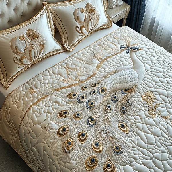 Majestic White Peacock quilted 3-piece bedding set on a made bed with two matching pillow shams