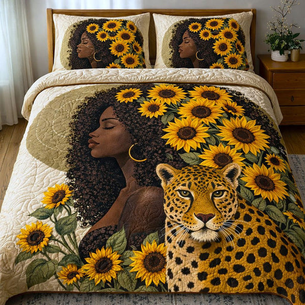 Melanin quilted 3-piece bedding set on a made bed with two matching pillow shams