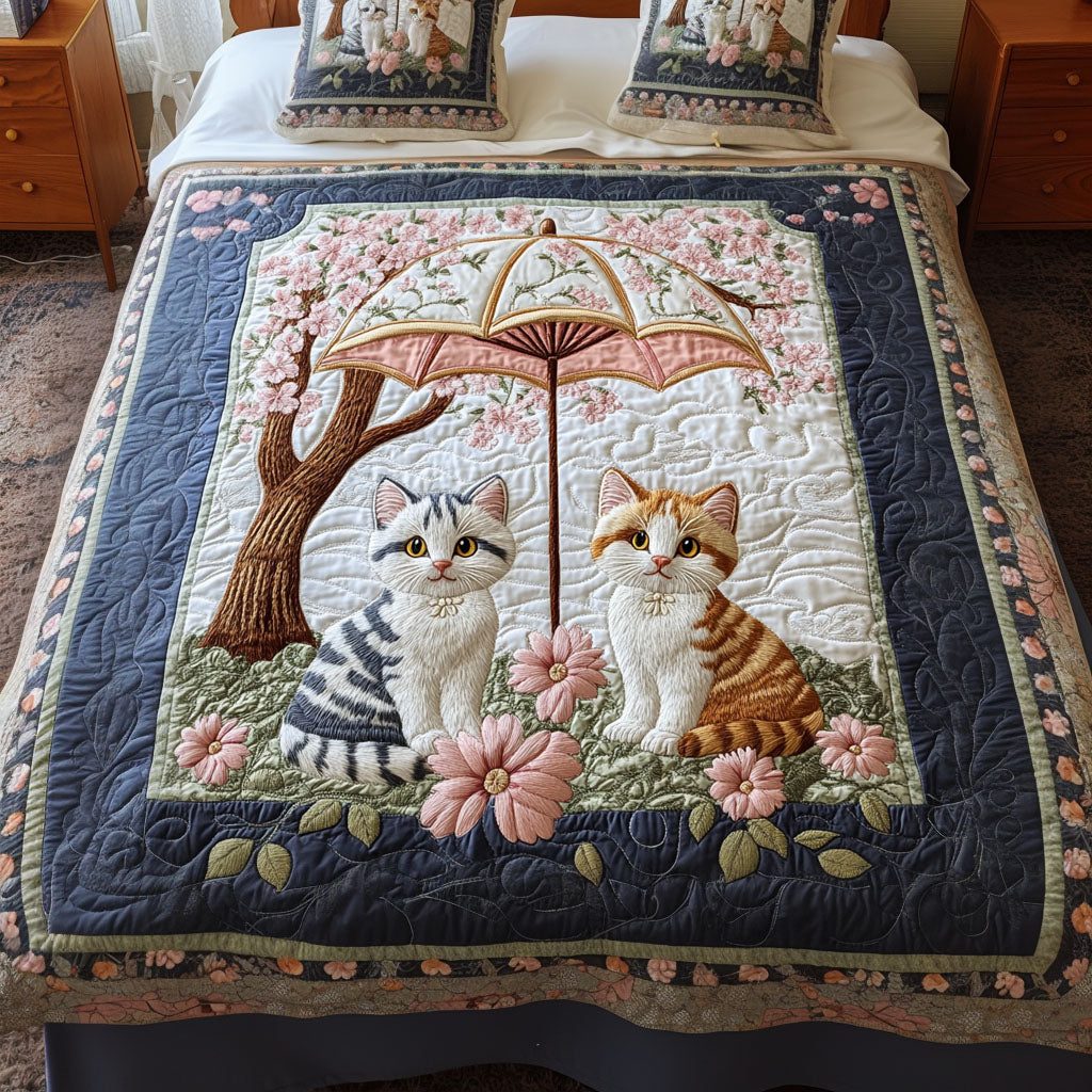 Meow Harmony quilted 3-piece bedding set on a made bed with two matching pillow shams
