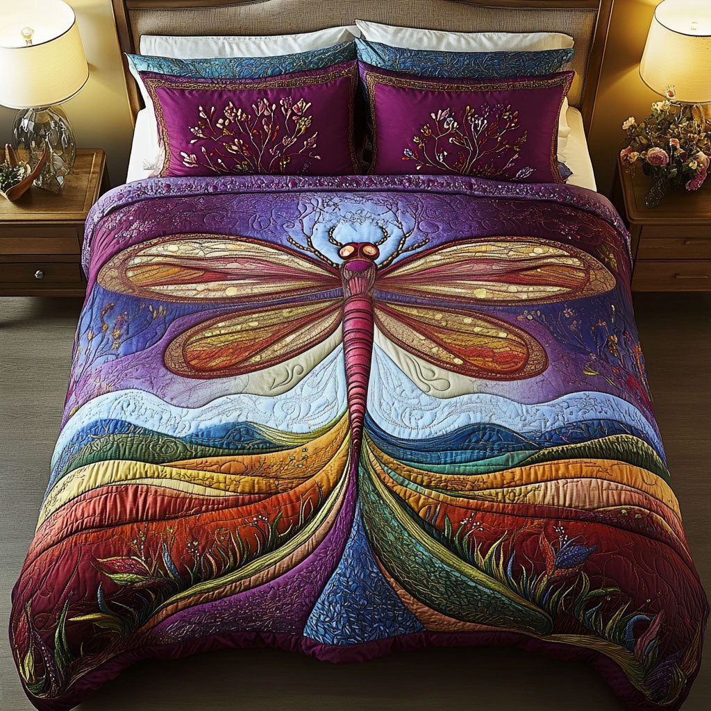 Midnight Flutter quilted 3-piece bedding set on a made bed with two matching pillow shams