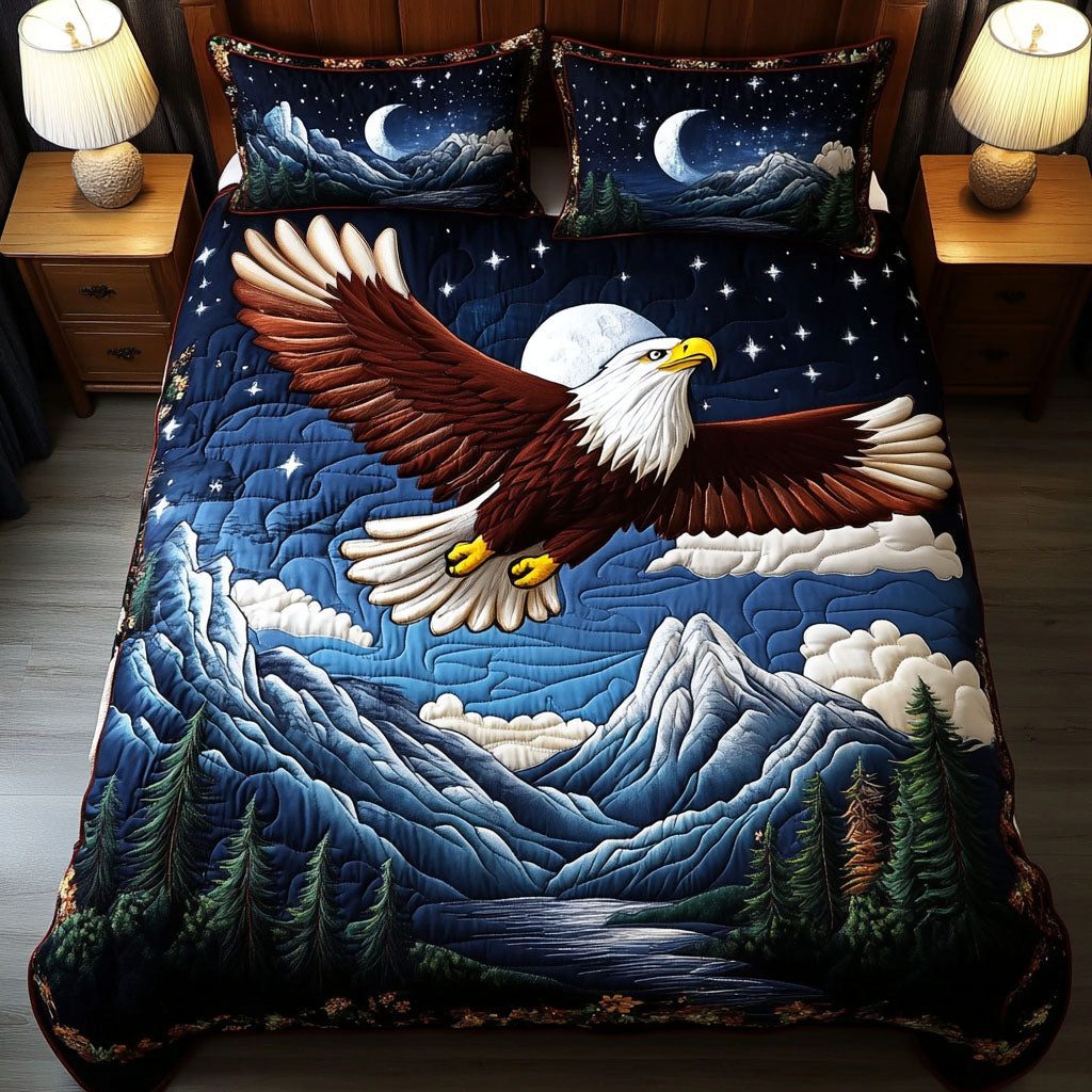 Midnight Soar quilted 3-piece bedding set on a made bed with two matching pillow shams