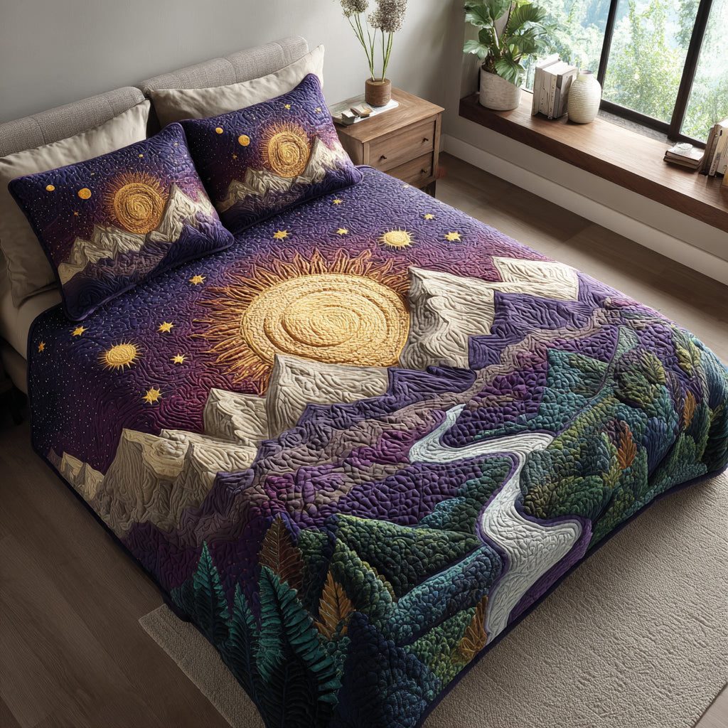 Midnight Sun Mountain quilted 3-piece bedding set on a made bed with two matching pillow shams