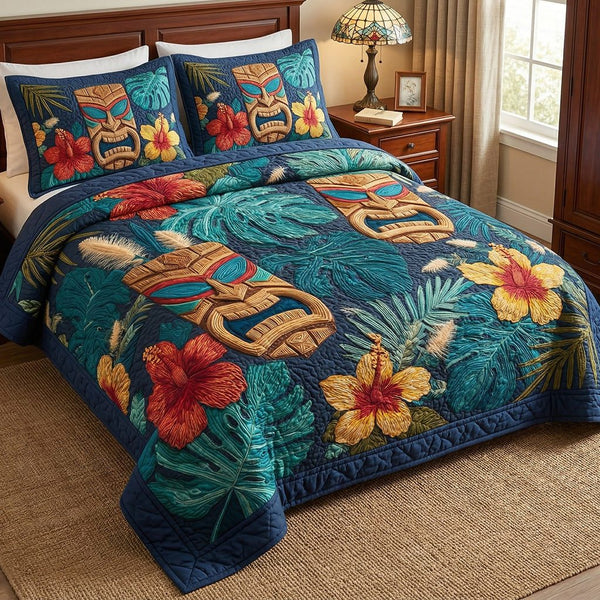 Midnight Tiki quilted 3-piece bedding set on a made bed with two matching pillow shams
