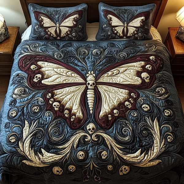 Midnight Wings quilted 3-piece bedding set on a made bed with two matching pillow shams