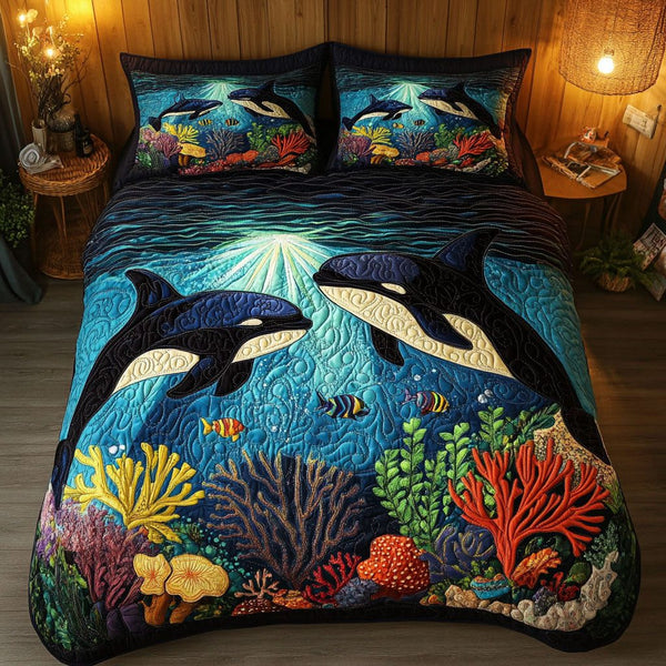 Moonlit Diver quilted 3-piece bedding set on a made bed with two matching pillow shams