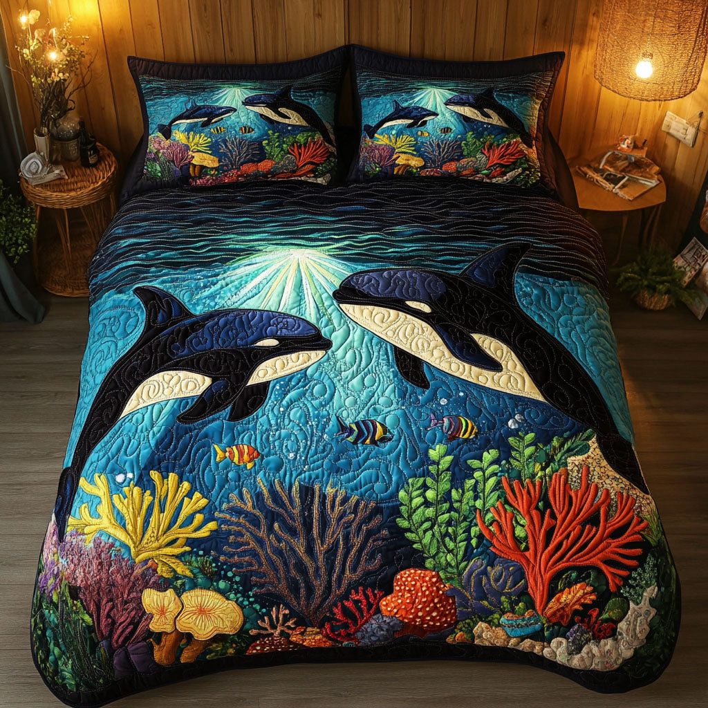 Moonlit Diver quilted 3-piece bedding set on a made bed with two matching pillow shams
