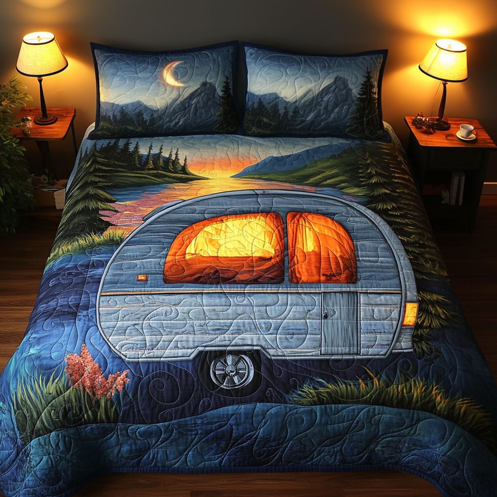 Moonlit Escape quilted 3-piece bedding set on a made bed with two matching pillow shams