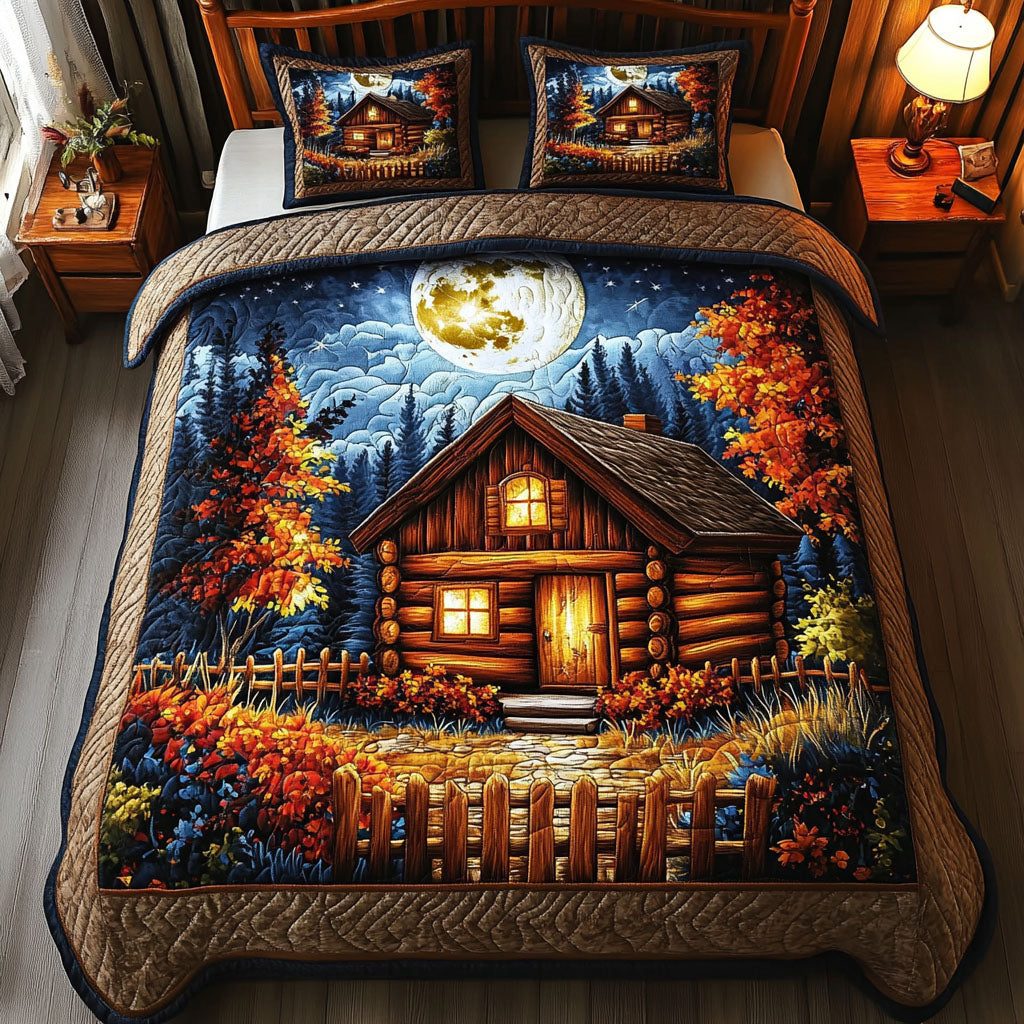 Moonlit Haven quilted 3-piece bedding set on a made bed with two matching pillow shams