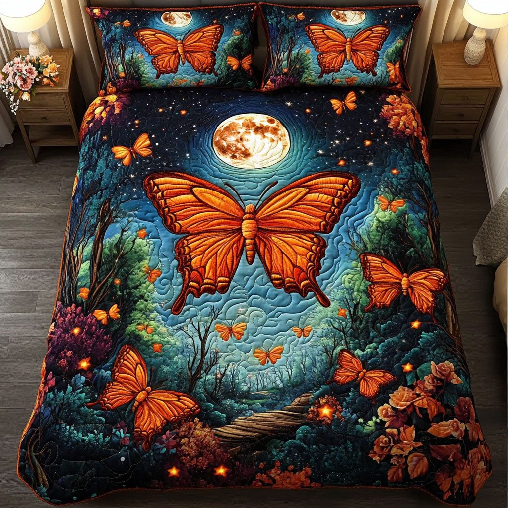Moonlit Monarch quilted 3-piece bedding set on a made bed with two matching pillow shams