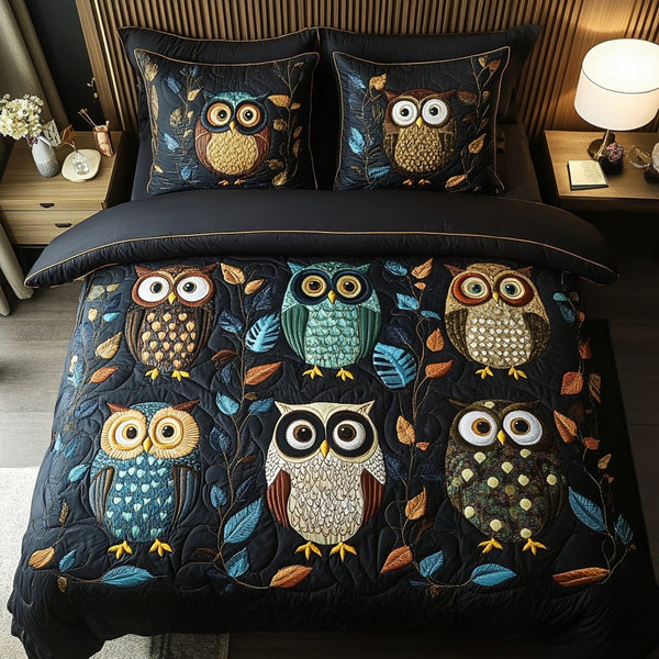 Moonlit Owl quilted 3-piece bedding set on a made bed with two matching pillow shams