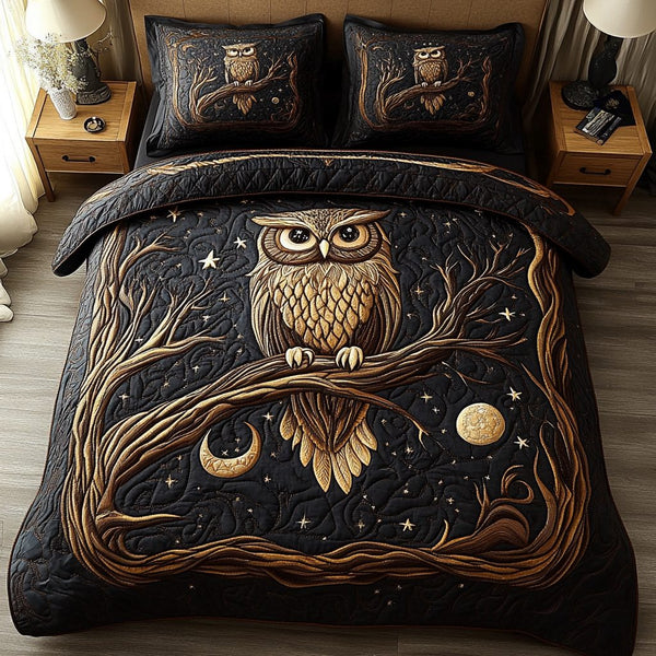 Moonlit Owl quilted 3-piece bedding set on a made bed with two matching pillow shams