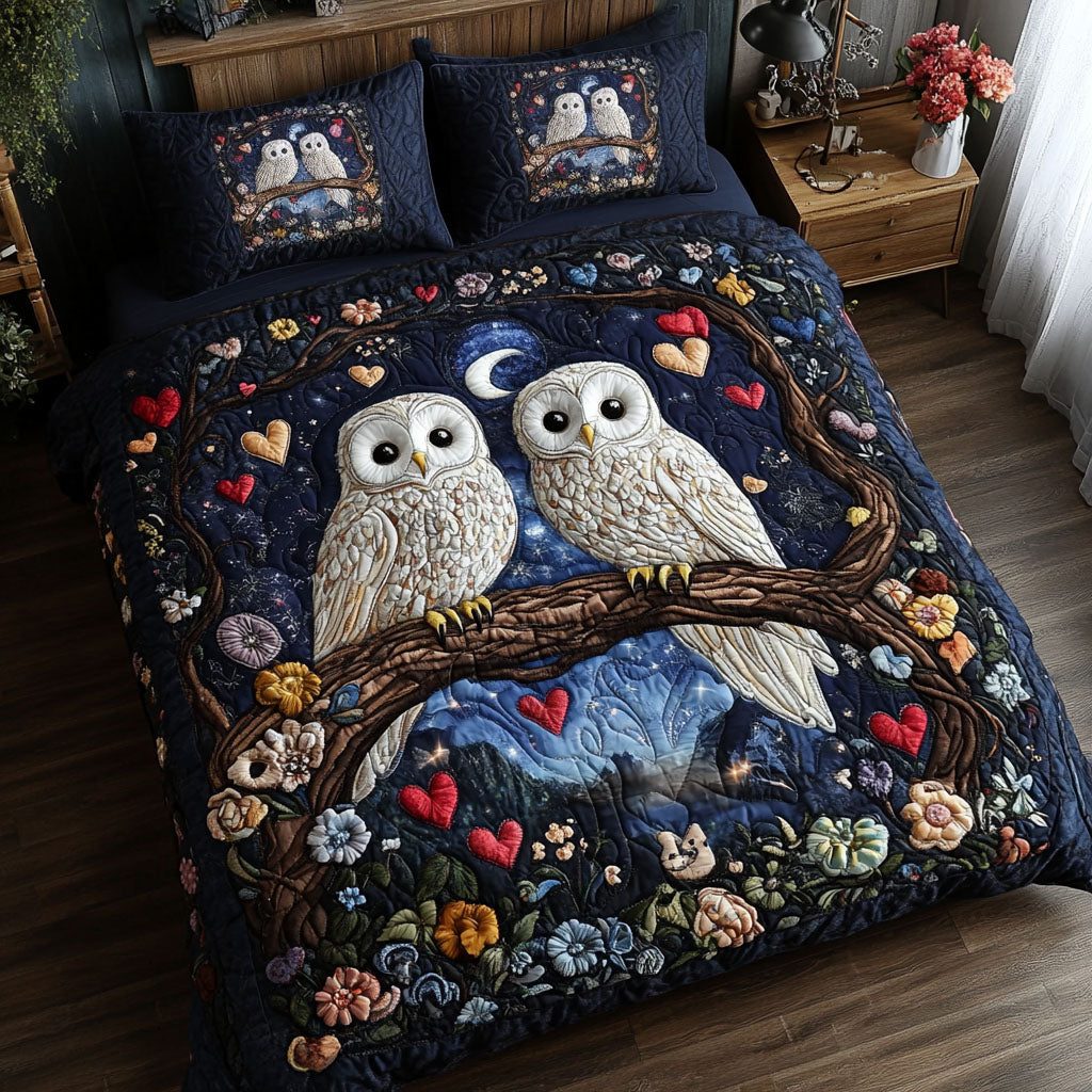 Moonlit Owls quilted 3-piece bedding set on a made bed with two matching pillow shams