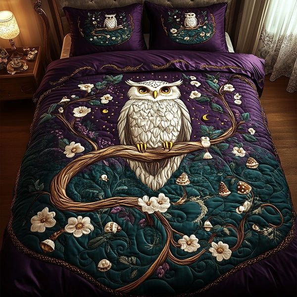 Moonlit Perch quilted 3-piece bedding set on a made bed with two matching pillow shams