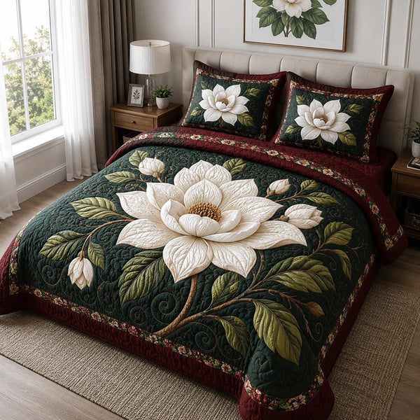 Moonlit Petals quilted 3-piece bedding set on a made bed with two matching pillow shams