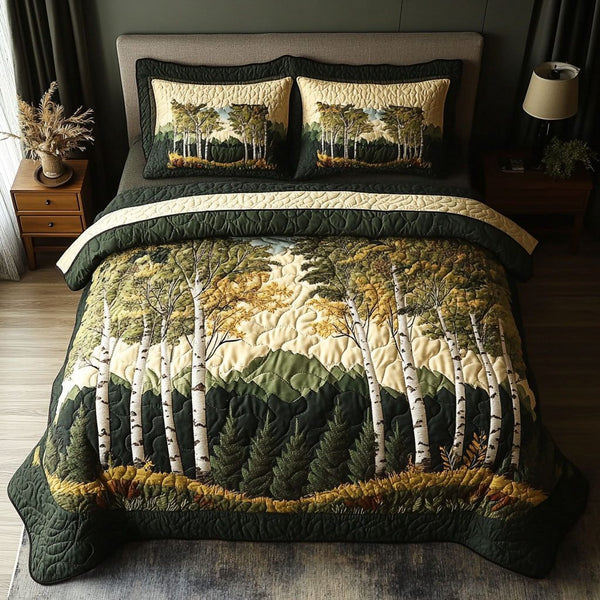 Morning Mist quilted 3-piece bedding set on a made bed with two matching pillow shams