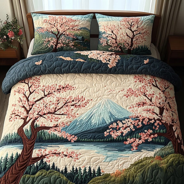 Mount Fuji Bloom quilted 3-piece bedding set on a made bed with two matching pillow shams