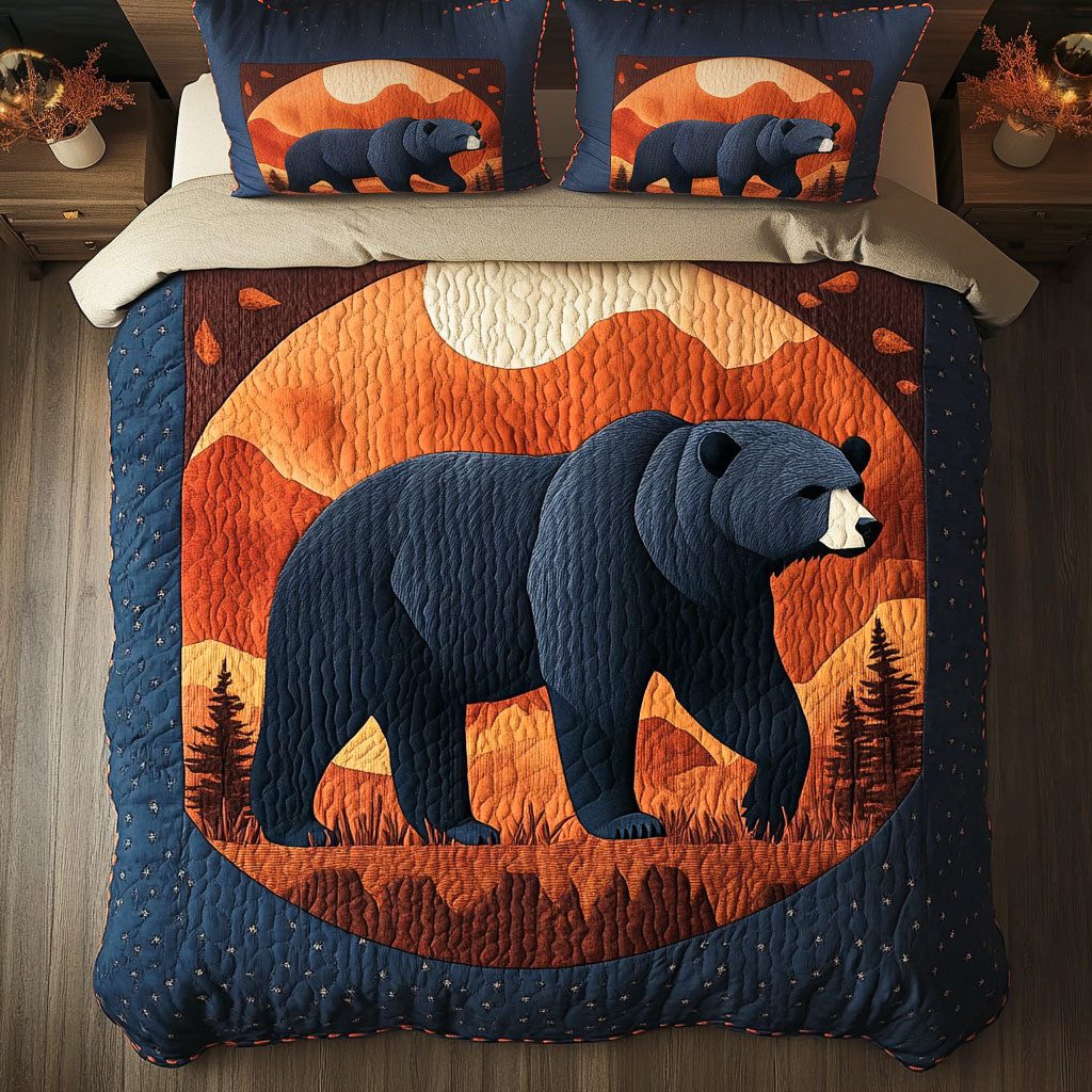 Mountain Bear Sunset quilted 3-piece bedding set on a made bed with two matching pillow shams