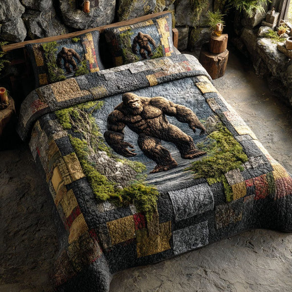 Mountain Bigfoot quilted 3-piece bedding set on a made bed with two matching pillow shams