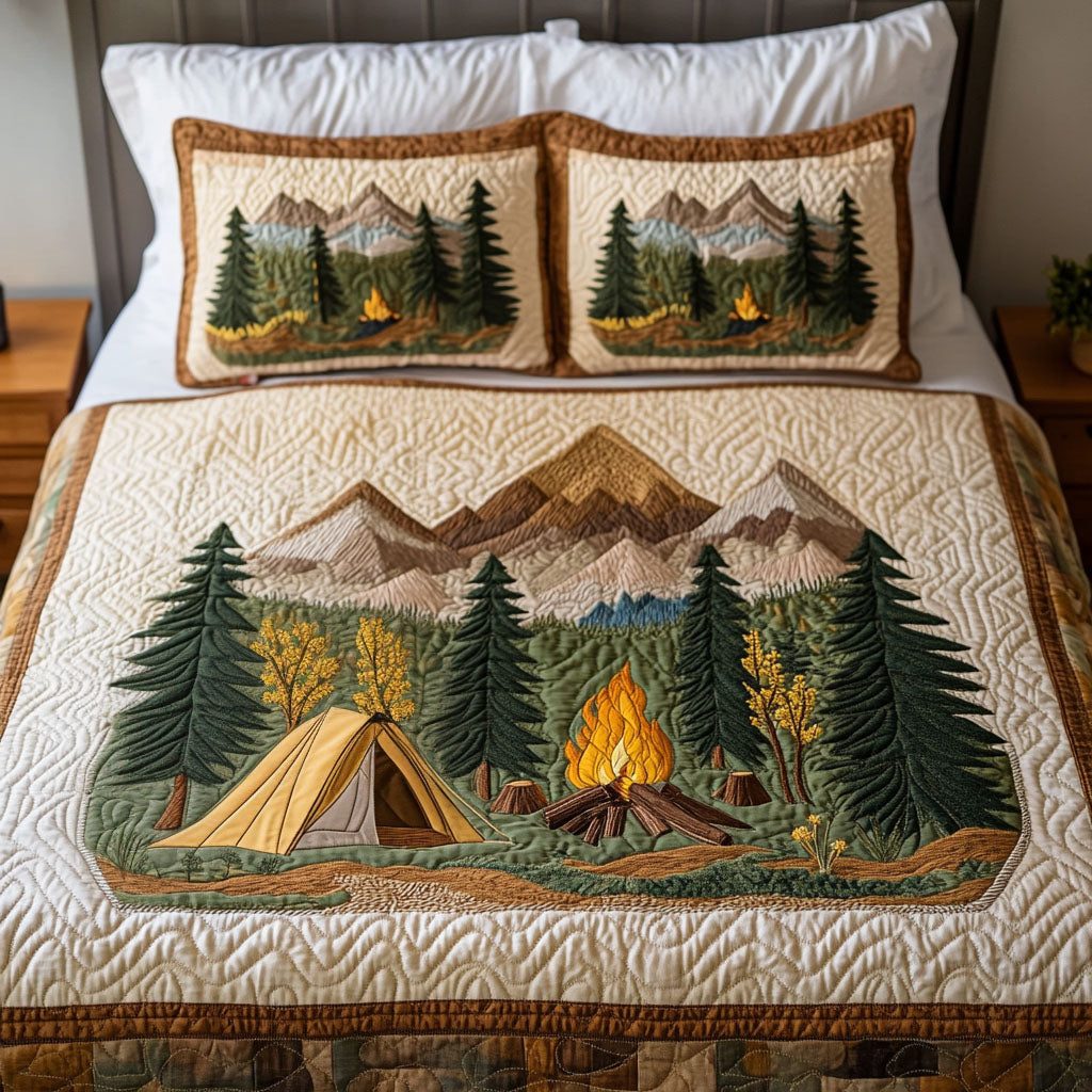 Mountain Campfire quilted 3-piece bedding set on a made bed with two matching pillow shams