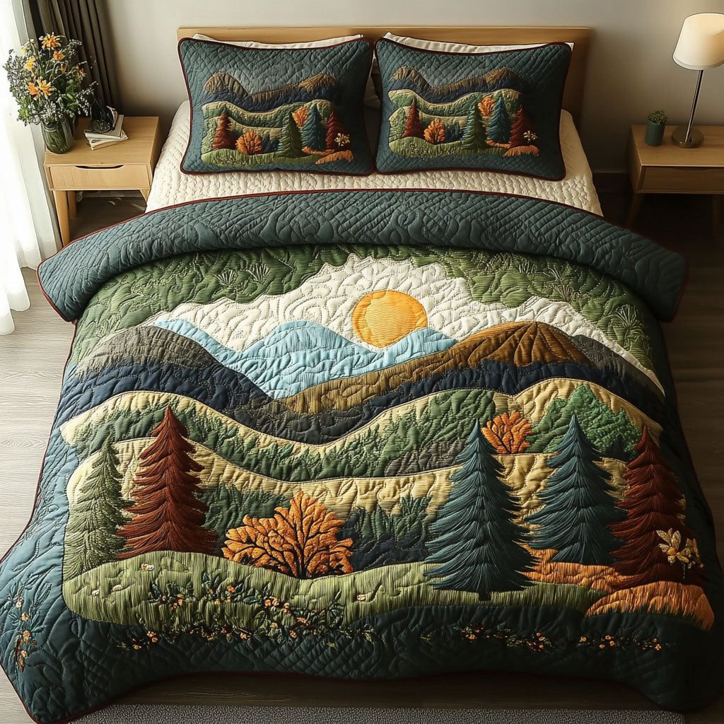 Mountain Dawn quilted 3-piece bedding set on a made bed with two matching pillow shams