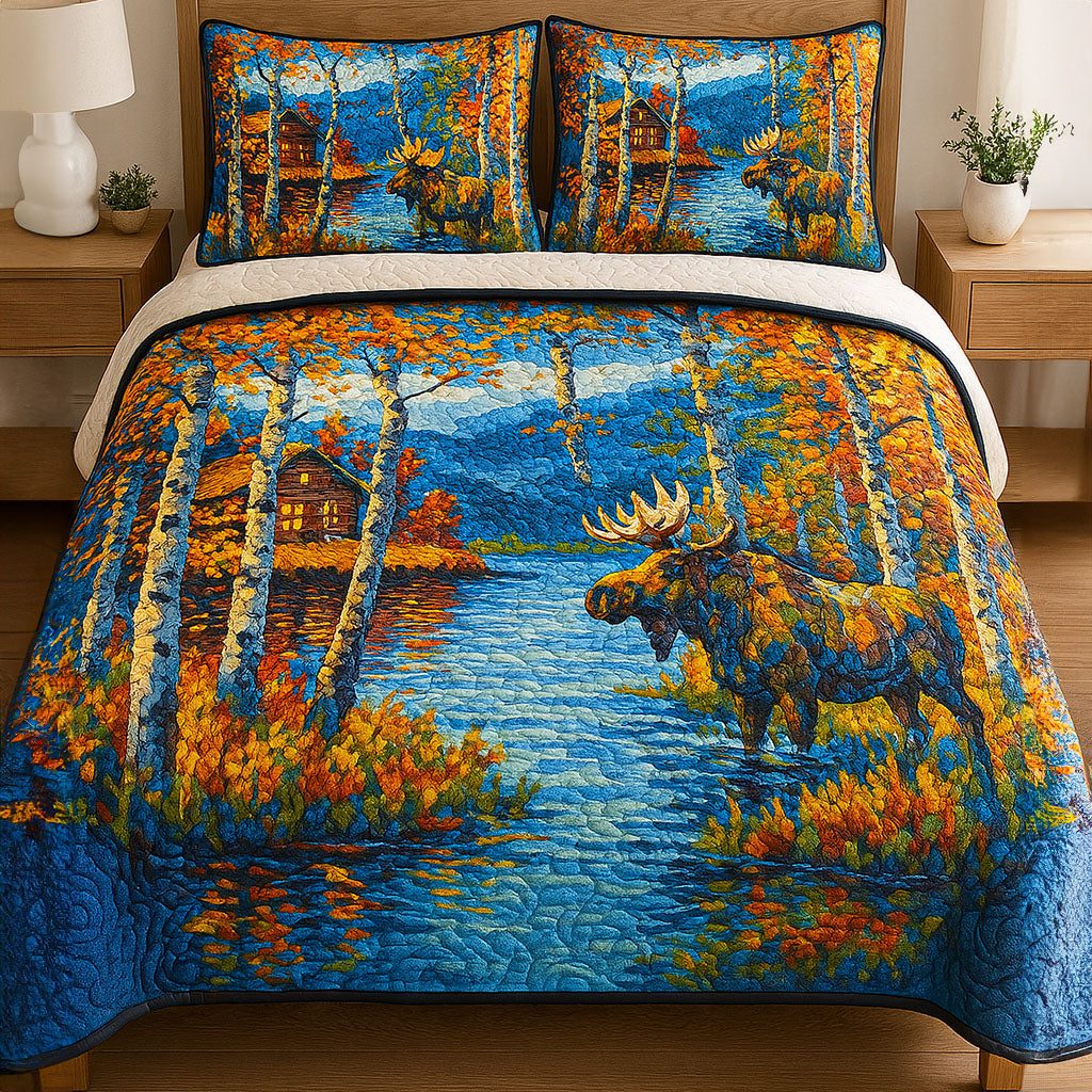 Mountain Escape quilted 3-piece bedding set on a made bed with two matching pillow shams