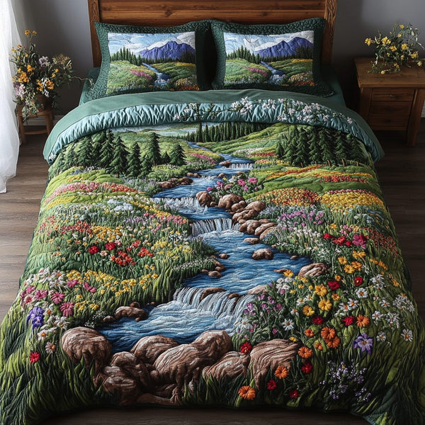 Mountain Flow quilted 3-piece bedding set on a made bed with two matching pillow shams