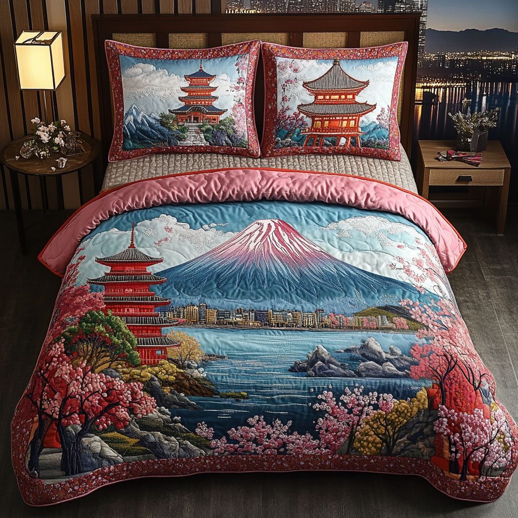 Mountain Majesty quilted 3-piece bedding set on a made bed with two matching pillow shams