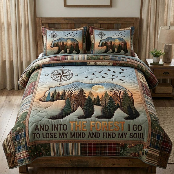 Mountain Pines quilted 3-piece bedding set on a made bed with two matching pillow shams