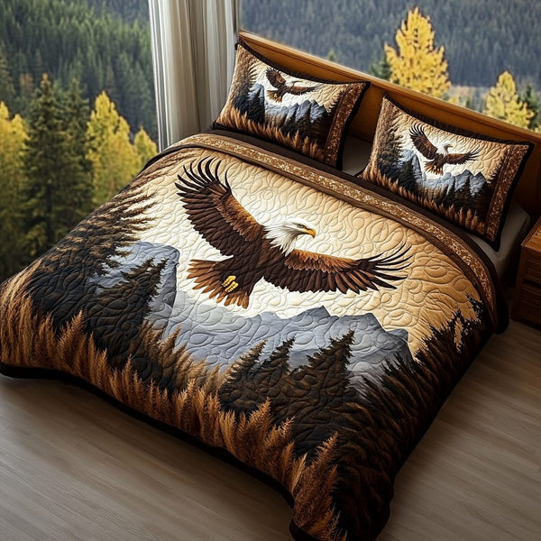 Mountain Sentinel quilted 3-piece bedding set on a made bed with two matching pillow shams
