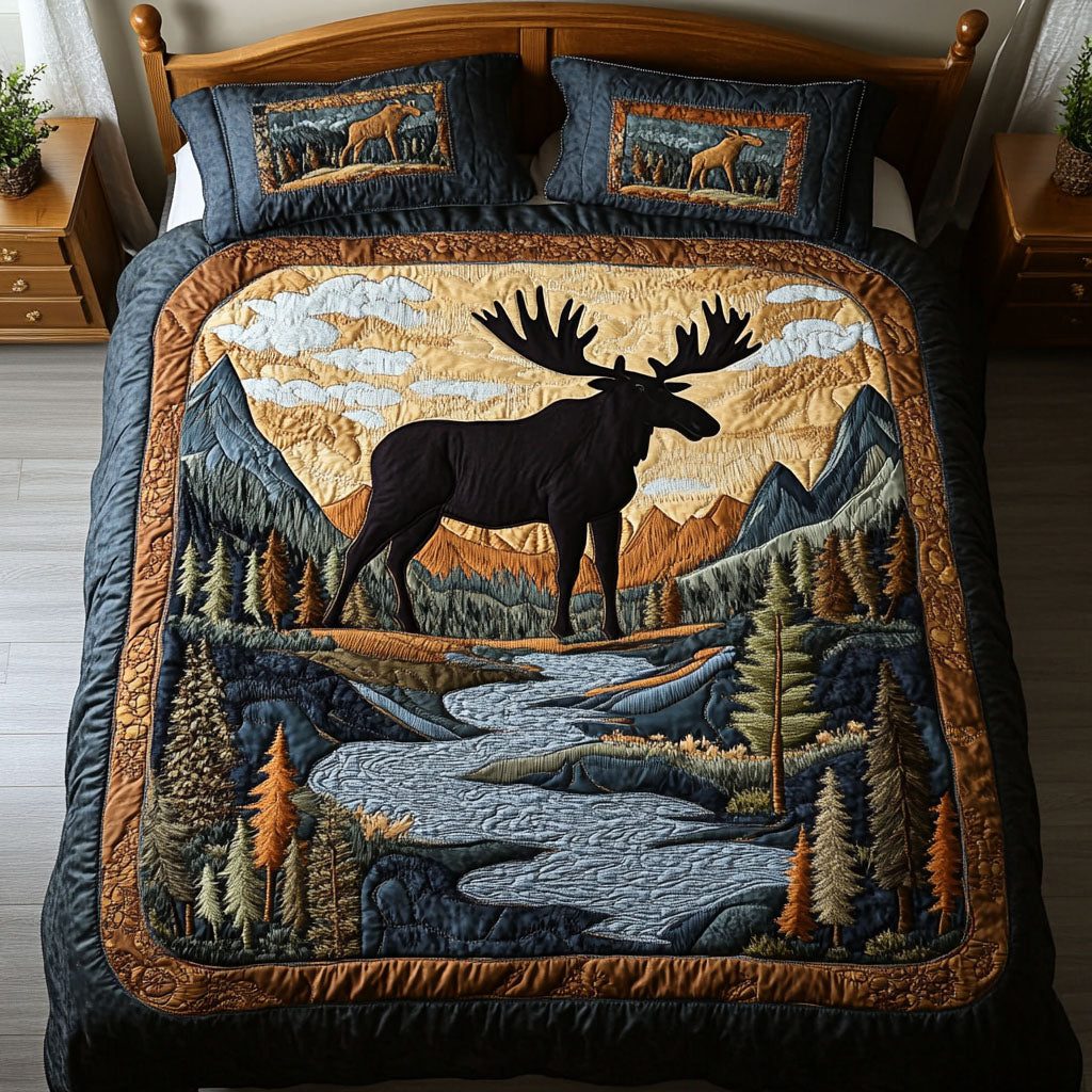 Mountain Serenity quilted 3-piece bedding set on a made bed with two matching pillow shams