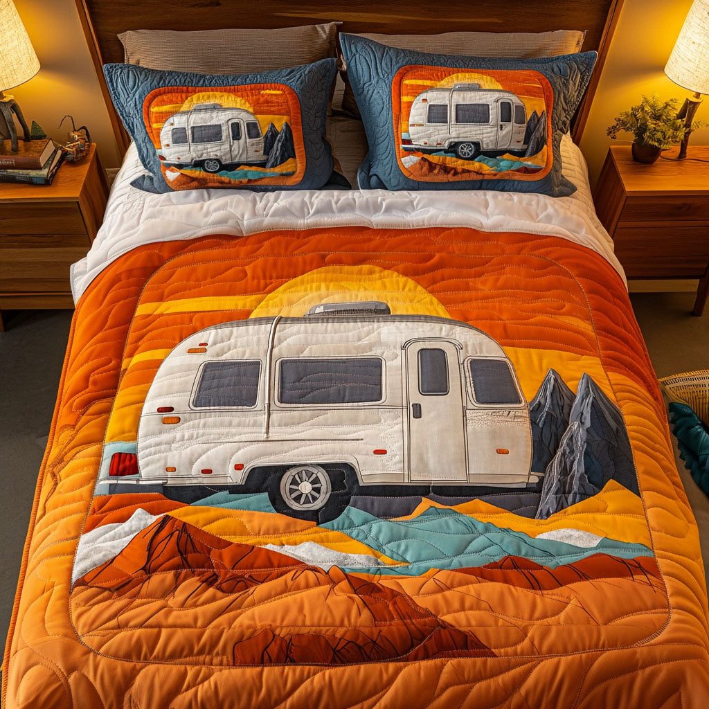 Mountain Travels quilted 3-piece bedding set on a made bed with two matching pillow shams