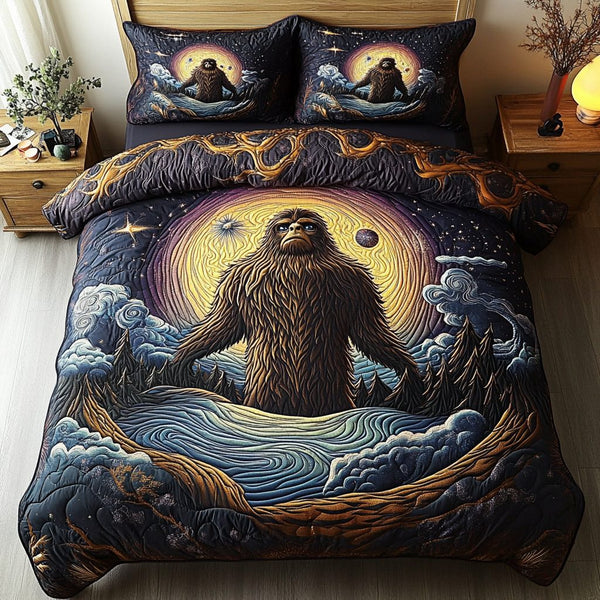 Mystic Bigfoot quilted 3-piece bedding set on a made bed with two matching pillow shams