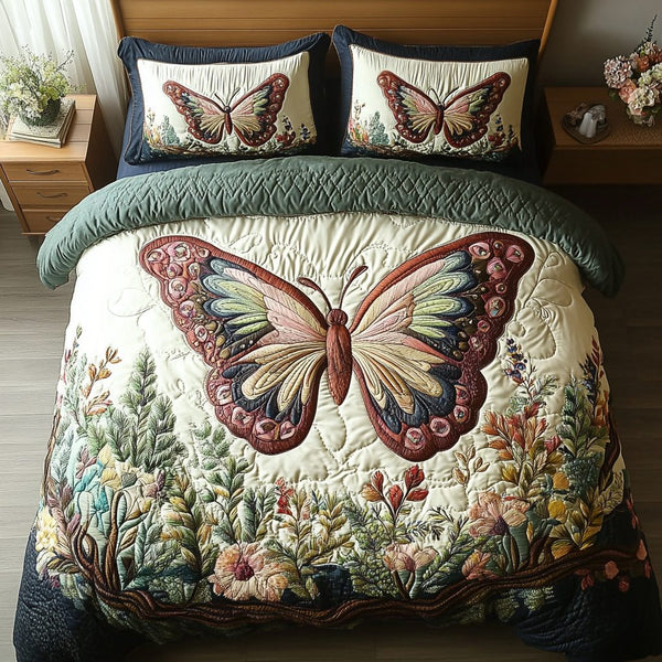 Mystic Butterfly quilted 3-piece bedding set on a made bed with two matching pillow shams