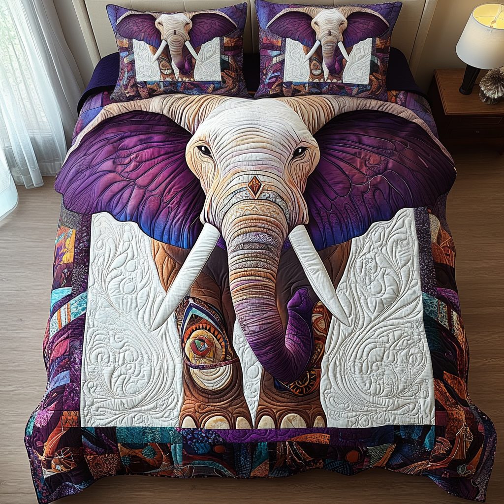 Mystic Elephant quilted 3-piece bedding set on a made bed with two matching pillow shams