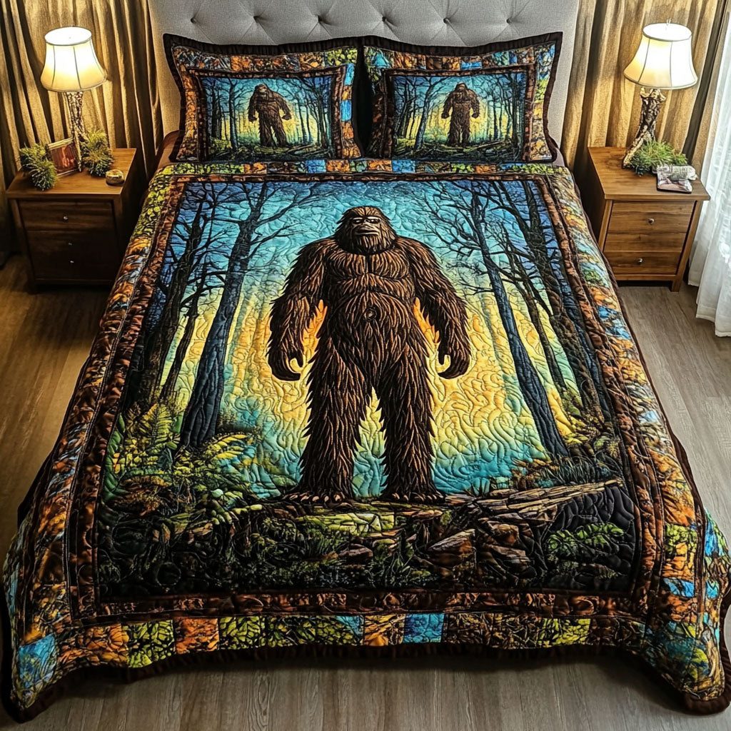 Mystic Forest quilted 3-piece bedding set on a made bed with two matching pillow shams