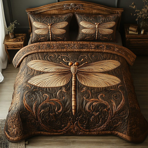 Mystic Glider quilted 3-piece bedding set on a made bed with two matching pillow shams