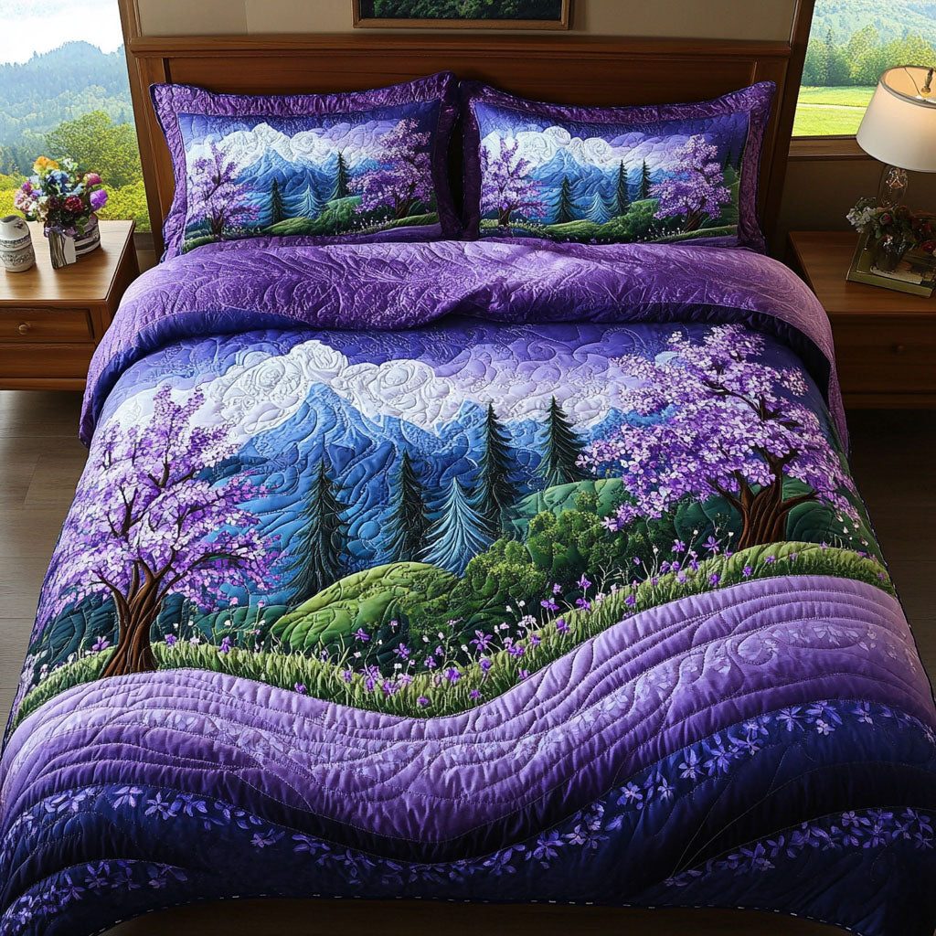 Mystic Meadows quilted 3-piece bedding set on a made bed with two matching pillow shams