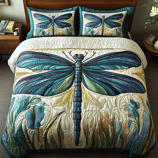 Mystic Wings quilted 3-piece bedding set on a made bed with two matching pillow shams
