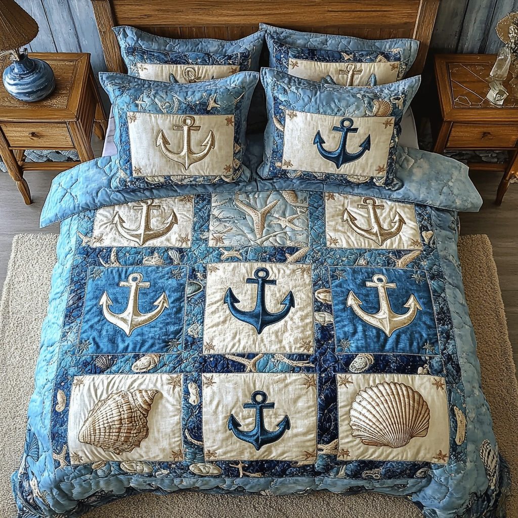 Nautical Anchor quilted 3-piece bedding set on a made bed in a light coastal bedroom