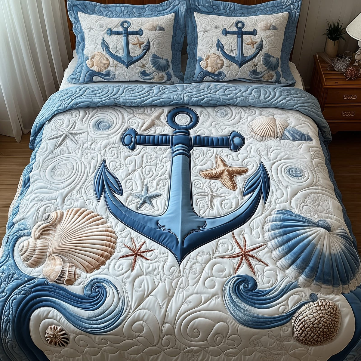 Nautical Anchor quilted 3-piece bedding set on a made bed in a light coastal bedroom