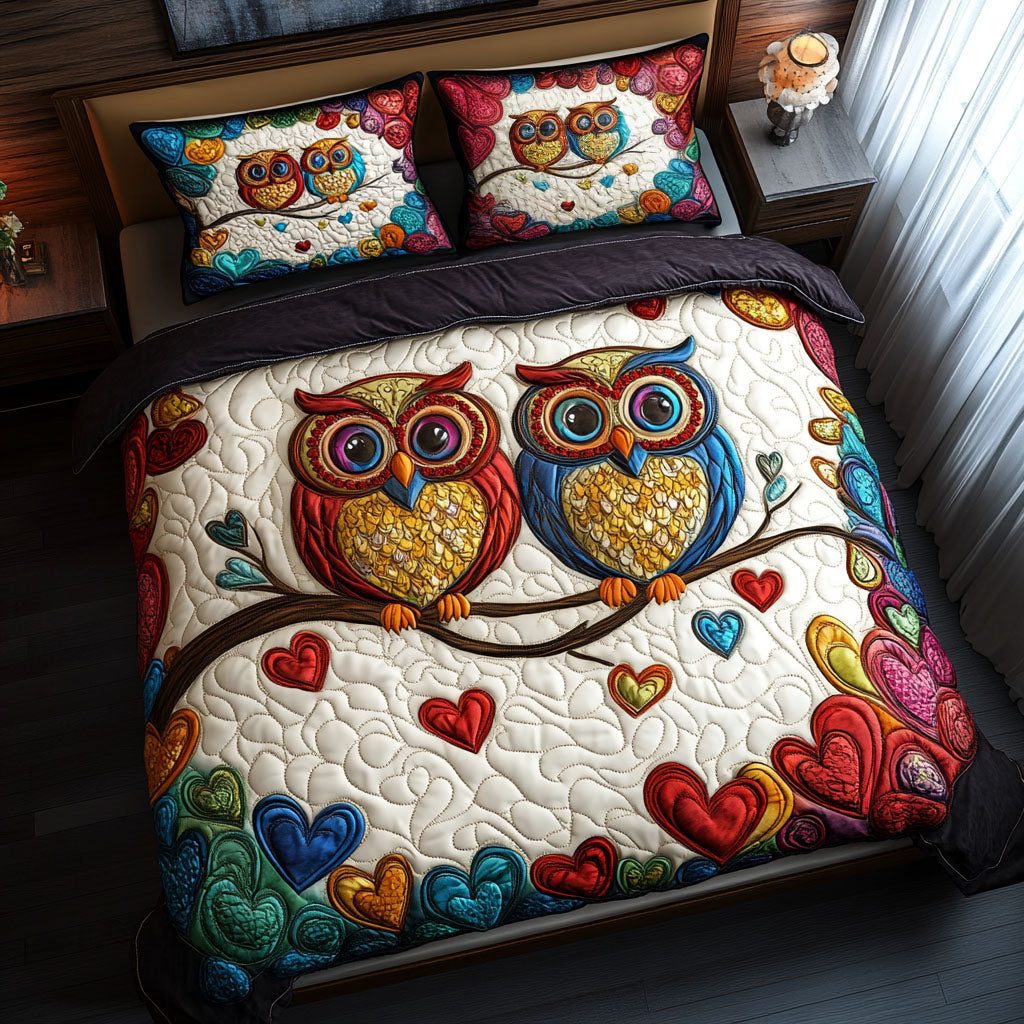 Nestled Hearts quilted 3-piece bedding set on a made bed with two matching pillow shams