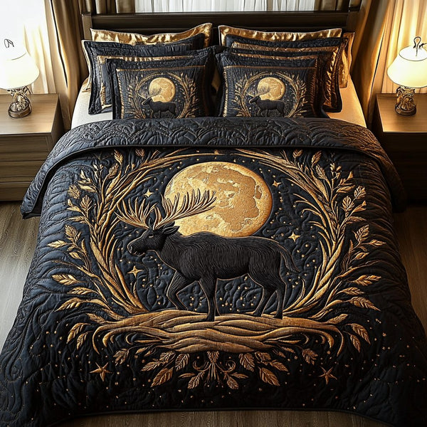 Night Haven quilted 3-piece bedding set on a made bed with two matching pillow shams