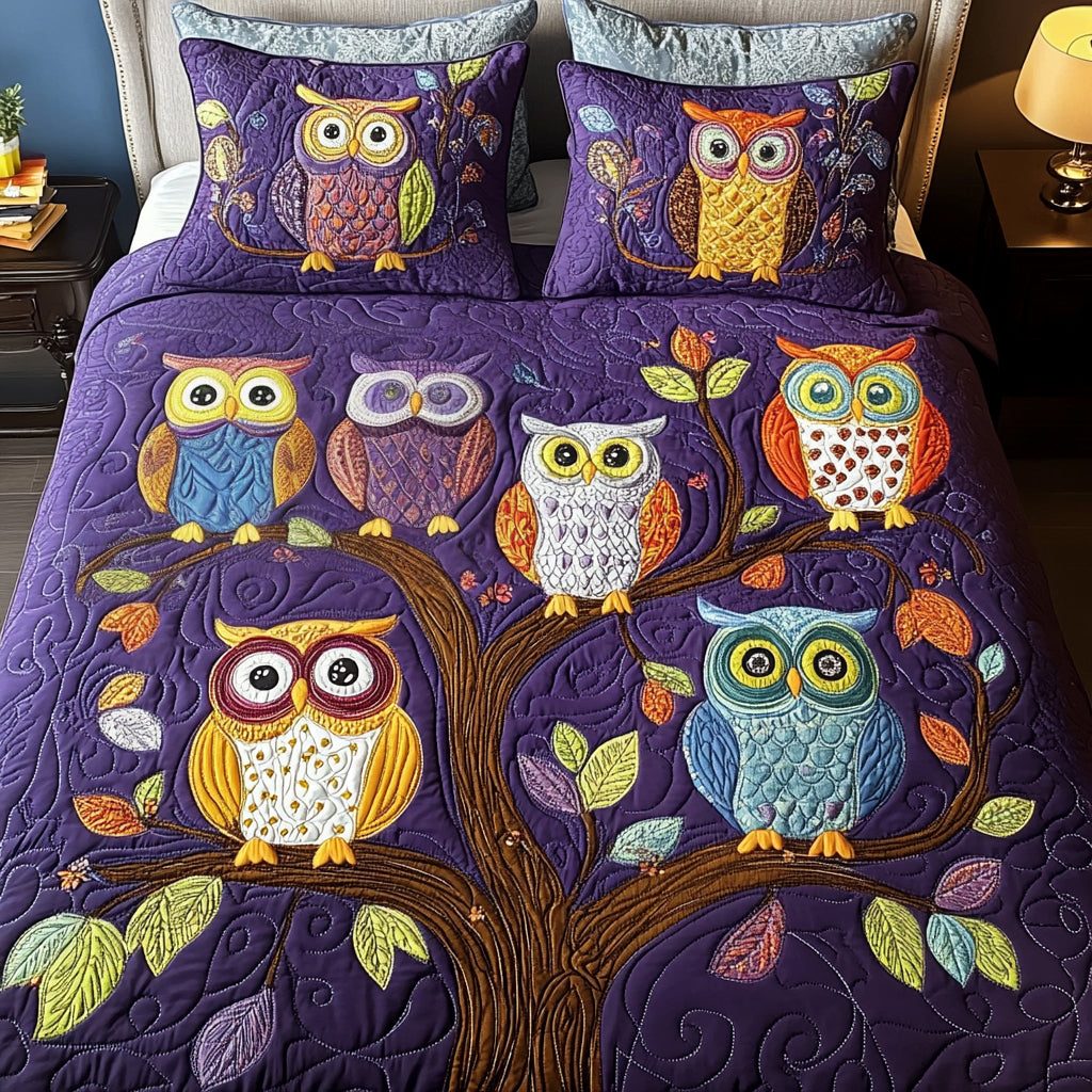 Night Watch quilted 3-piece bedding set on a made bed with two matching pillow shams